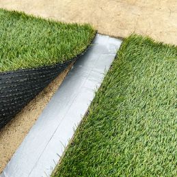 Bande de liaison pour gazon synthétique - 12cm x 10m