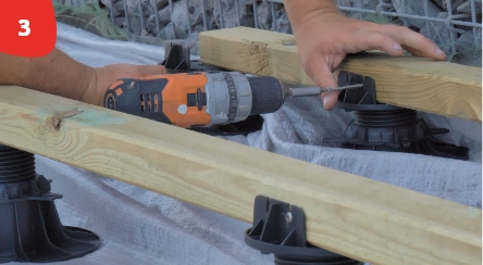 screwing of the joists to the pedestals